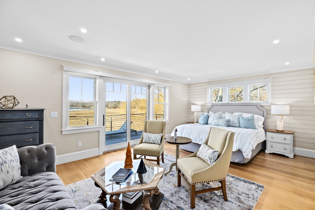 67 Border Street Scituate, MA 02066 - Photo 16 of 42 a living room with furniture and a window
