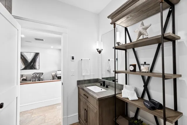 a view of living room with furniture and a window