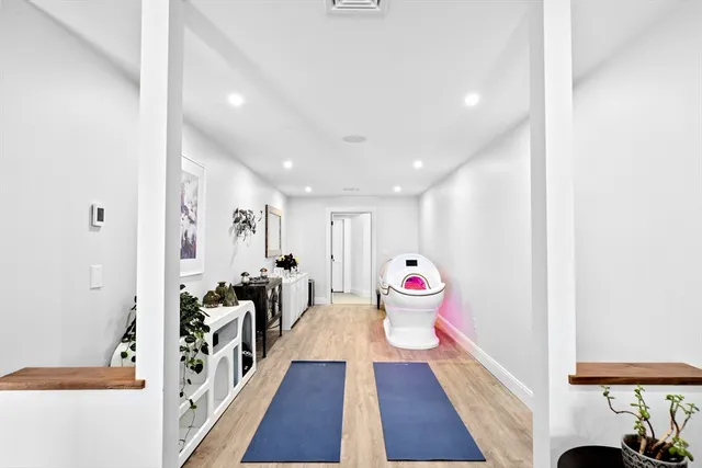 a very nice looking room with wooden floor