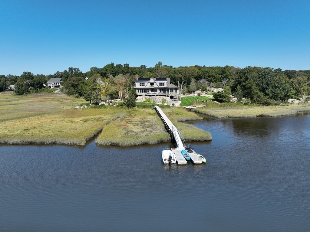 67 Border Street Scituate, MA 02066 - Photo 40 of 42 a view of a lake with a mountain in the background