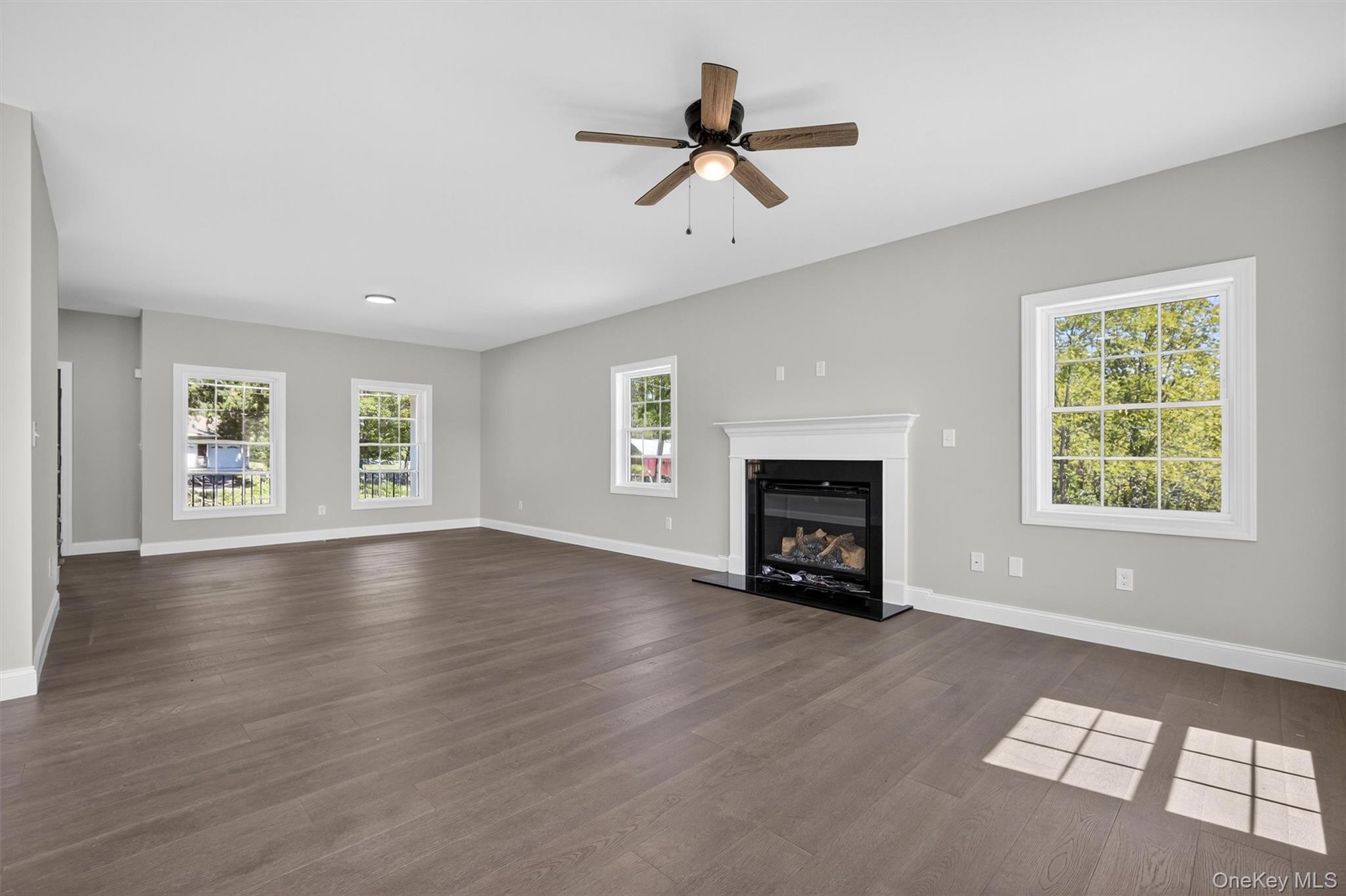 Lot 4 Kings Hill Road Walden, NY 12586 - Photo 12 of 34 a view of an empty room with a window and fireplace