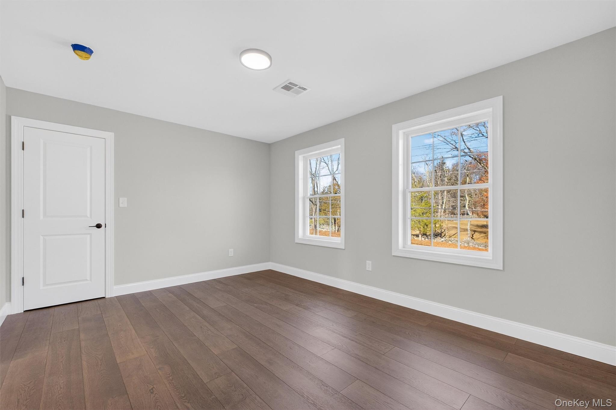 Lot 4 Kings Hill Road Walden, NY 12586 - Photo 22 of 34 a view of an empty room with wooden floor and a window