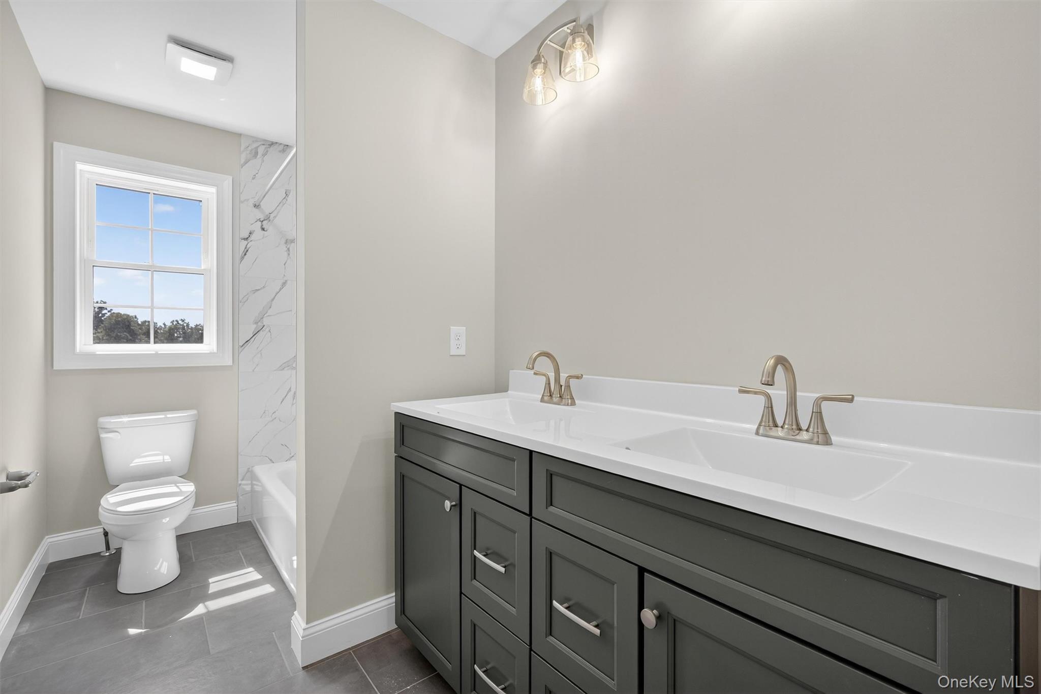 Lot 4 Kings Hill Road Walden, NY 12586 - Photo 24 of 34 a bathroom with a sink a toilet and a mirror