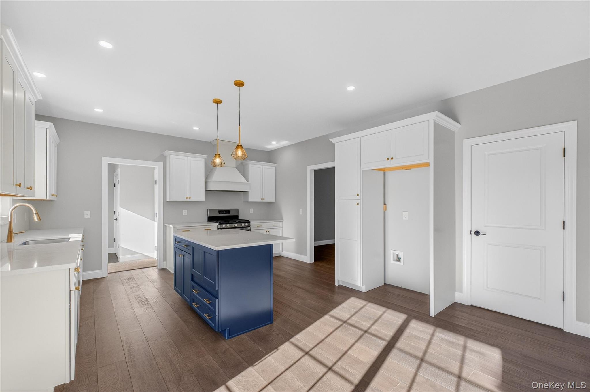 Lot 4 Kings Hill Road Walden, NY 12586 - Photo 8 of 34 a kitchen with kitchen island wooden floors appliances and cabinets
