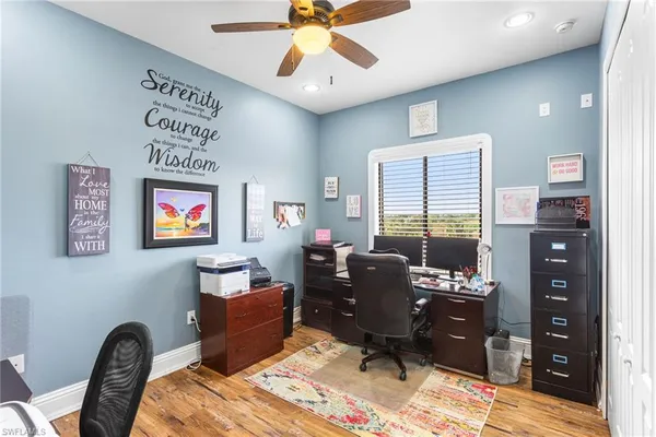 a bedroom with furniture and a window