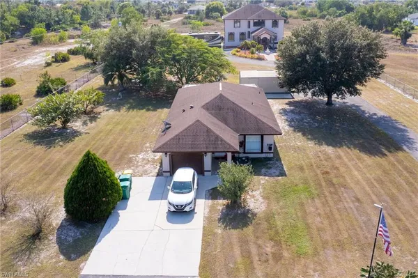 a view of house with outdoor space and sitting space