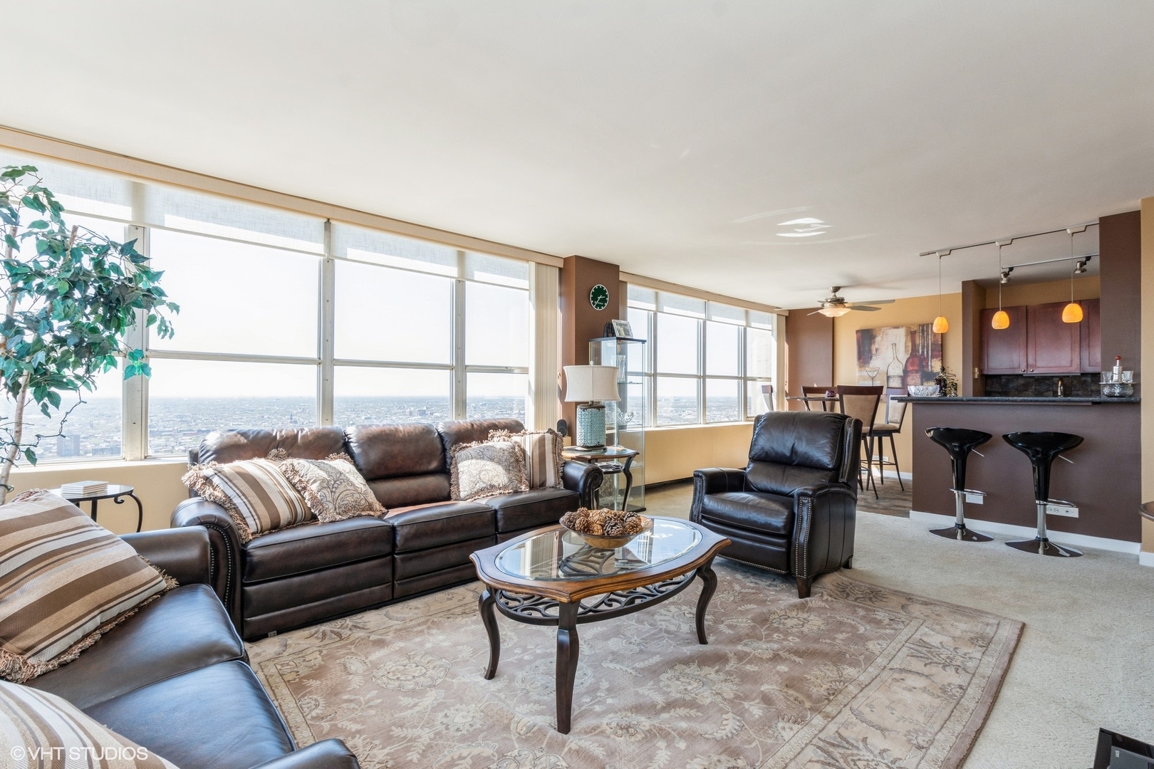 655 West Irving Park Road, Unit 4617 Chicago, IL 60613 - Photo 3 of 33 a living room with furniture and a large window