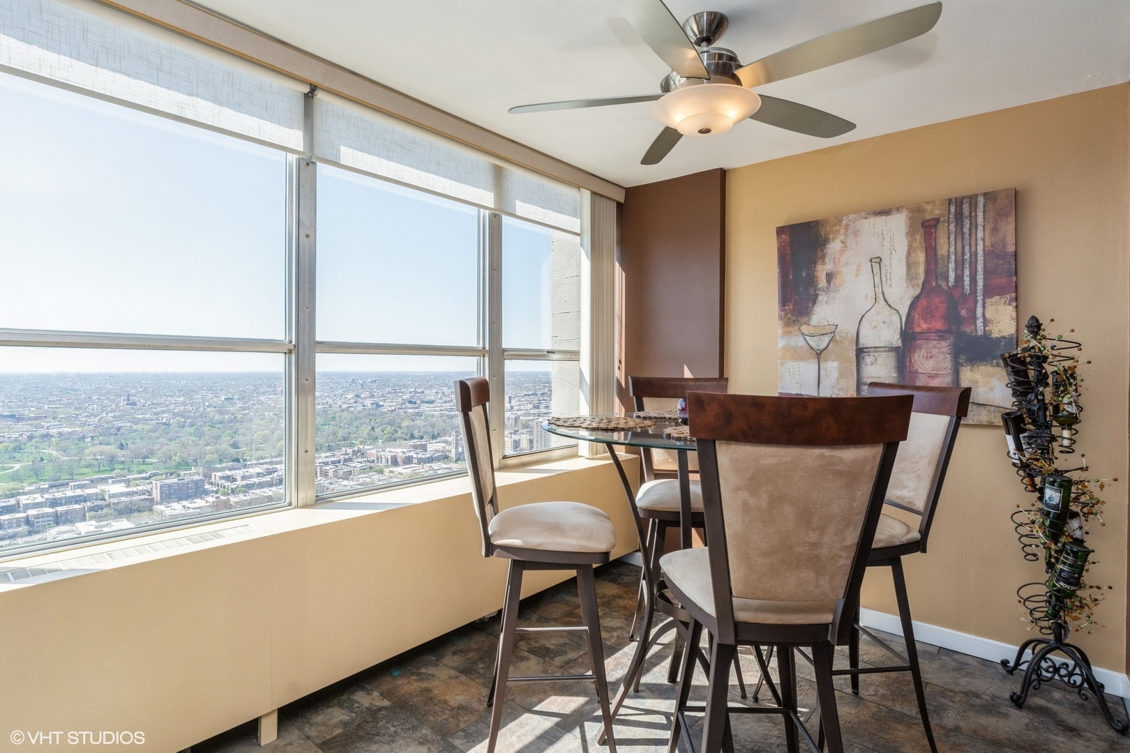 655 West Irving Park Road, Unit 4617 Chicago, IL 60613 - Photo 6 of 33 a dining room with furniture and window