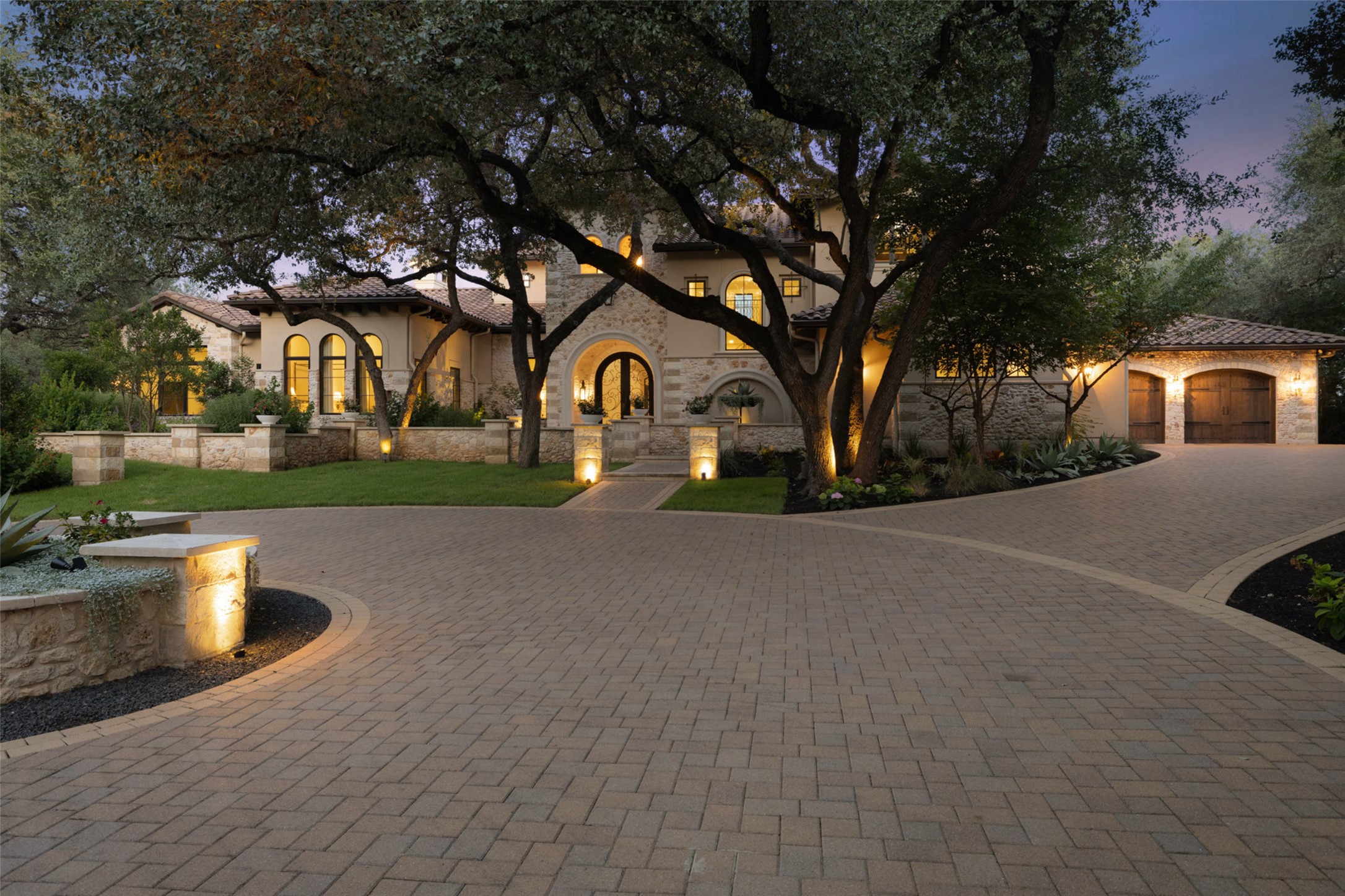 3667 Stoneridge Road Austin, TX 78746 - Photo 1 of 40 The front of the home is anchored by a 2-car wide circular drive, designed for smooth arrivals and a welcoming sense of flow.