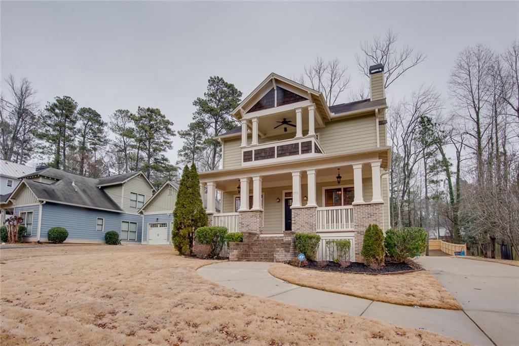 1708 Parkhill Drive Decatur, GA 30032 - Photo 1 of 1 a front view of a house with a yard