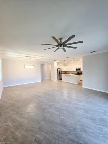 a view of a kitchen with a sink and a stove