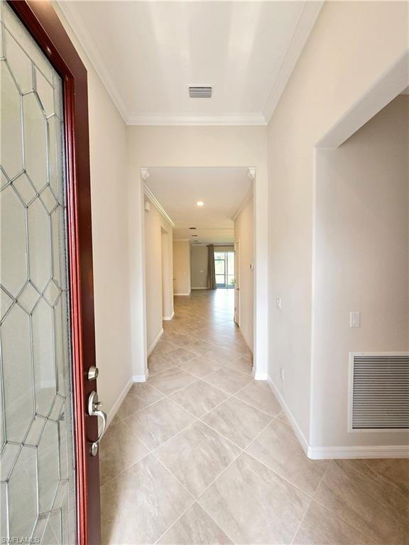 Undisclosed Address Naples, FL 34120 - Photo 3 of 21 a view of a hallway