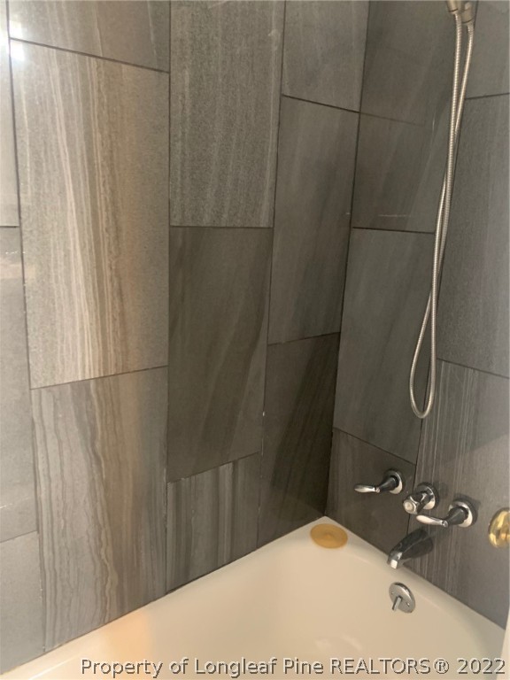 68 Flowers Settlemeyer Road Riegelwood, NC 28456 - Photo 20 of 28 a bathroom with a shower and a sink