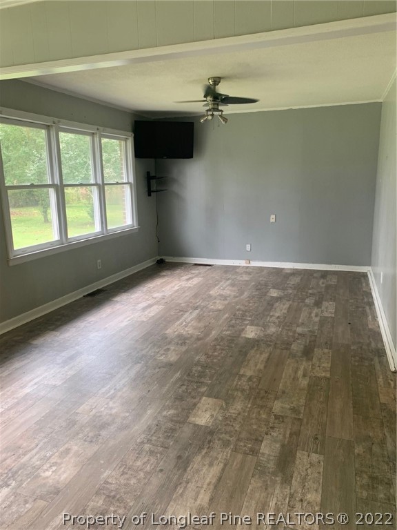 68 Flowers Settlemeyer Road Riegelwood, NC 28456 - Photo 8 of 28 a view of an empty room with a window