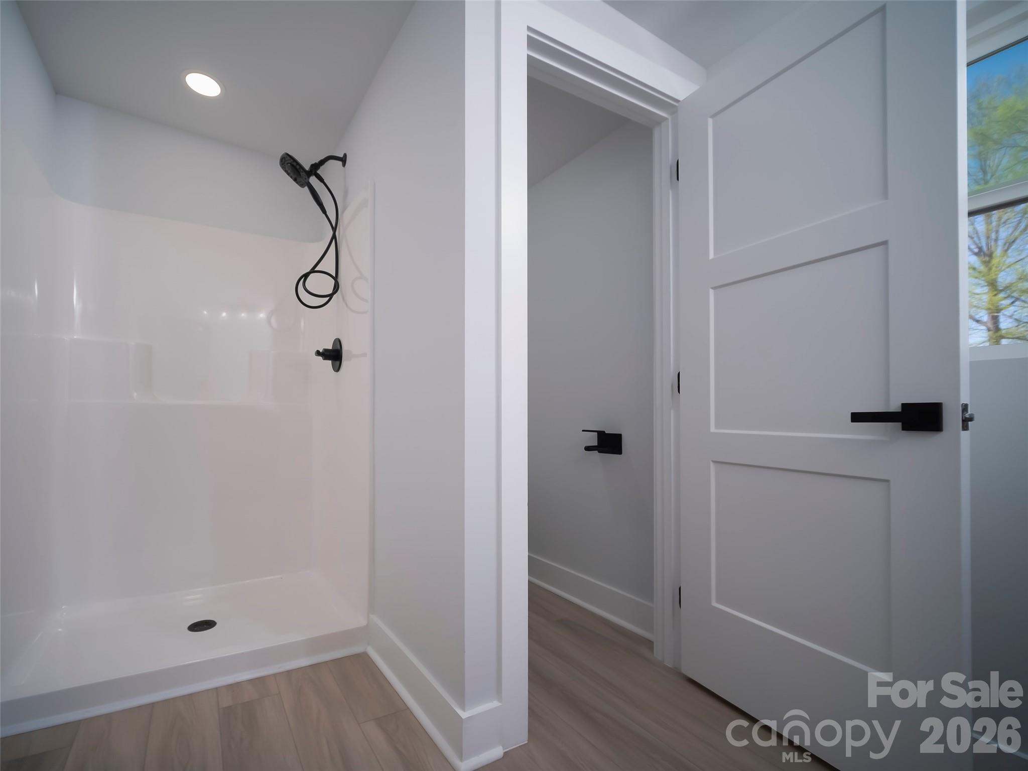 1325 Armstrong Road Belmont, NC 28012 - Photo 21 of 33 a bathroom with a glass shower door