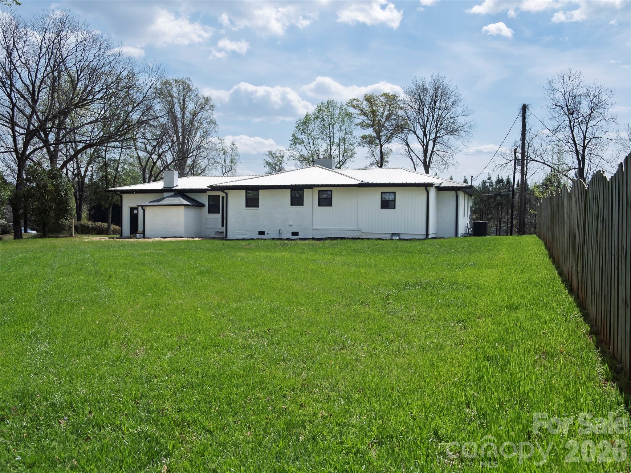1325 Armstrong Road Belmont, NC 28012 - Photo 31 of 33 a view of a house with a yard and trees
