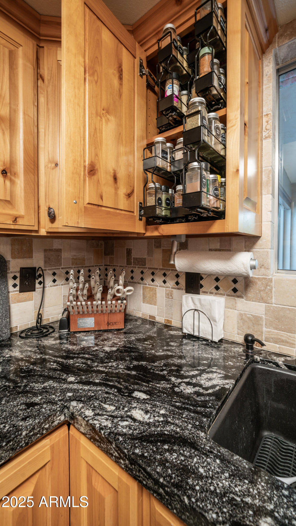 657 South Copper Drive Apache Junction, AZ 85120 - Photo 16 of 44 a kitchen with granite countertop a sink and a stove