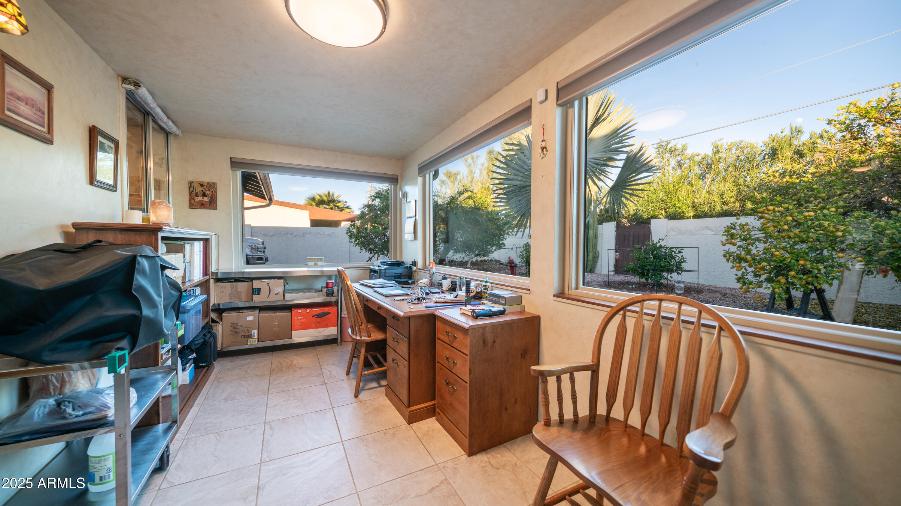 657 South Copper Drive Apache Junction, AZ 85120 - Photo 21 of 44 a view of a dining room with furniture window and outside view