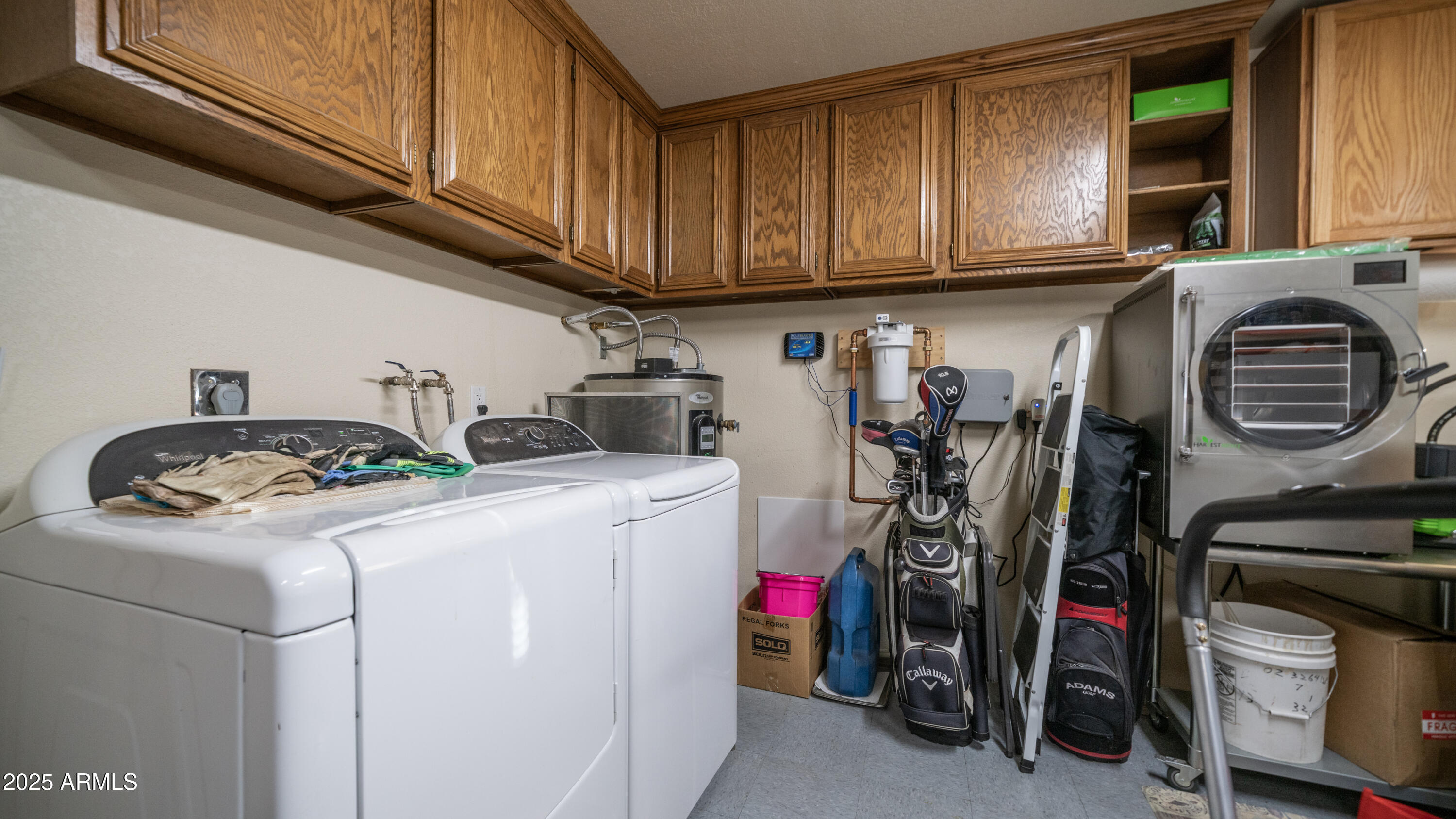 657 South Copper Drive Apache Junction, AZ 85120 - Photo 24 of 44 a utility room with dryer and washer