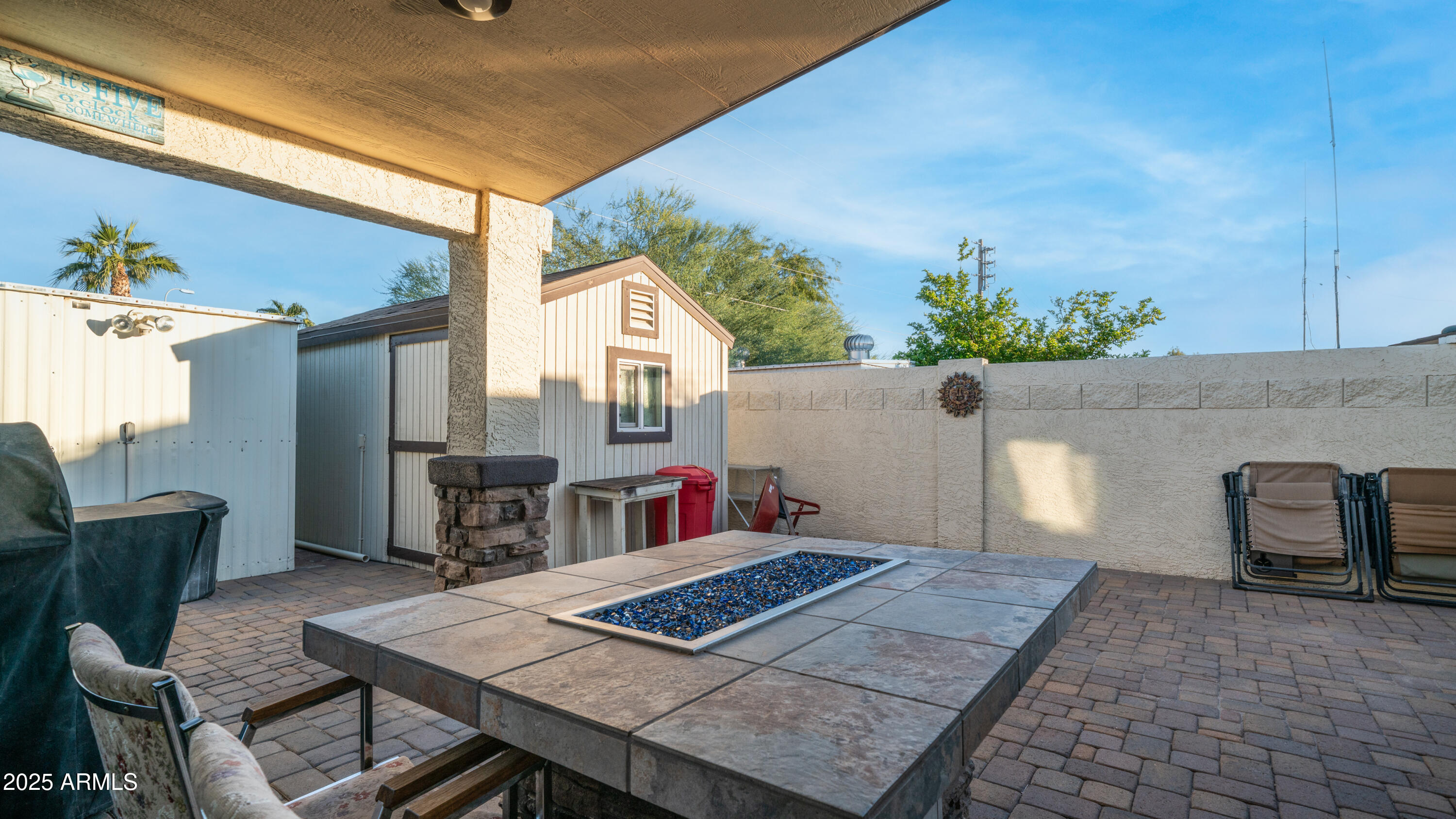 657 South Copper Drive Apache Junction, AZ 85120 - Photo 32 of 44 a view of a dinning table and chair in the patio