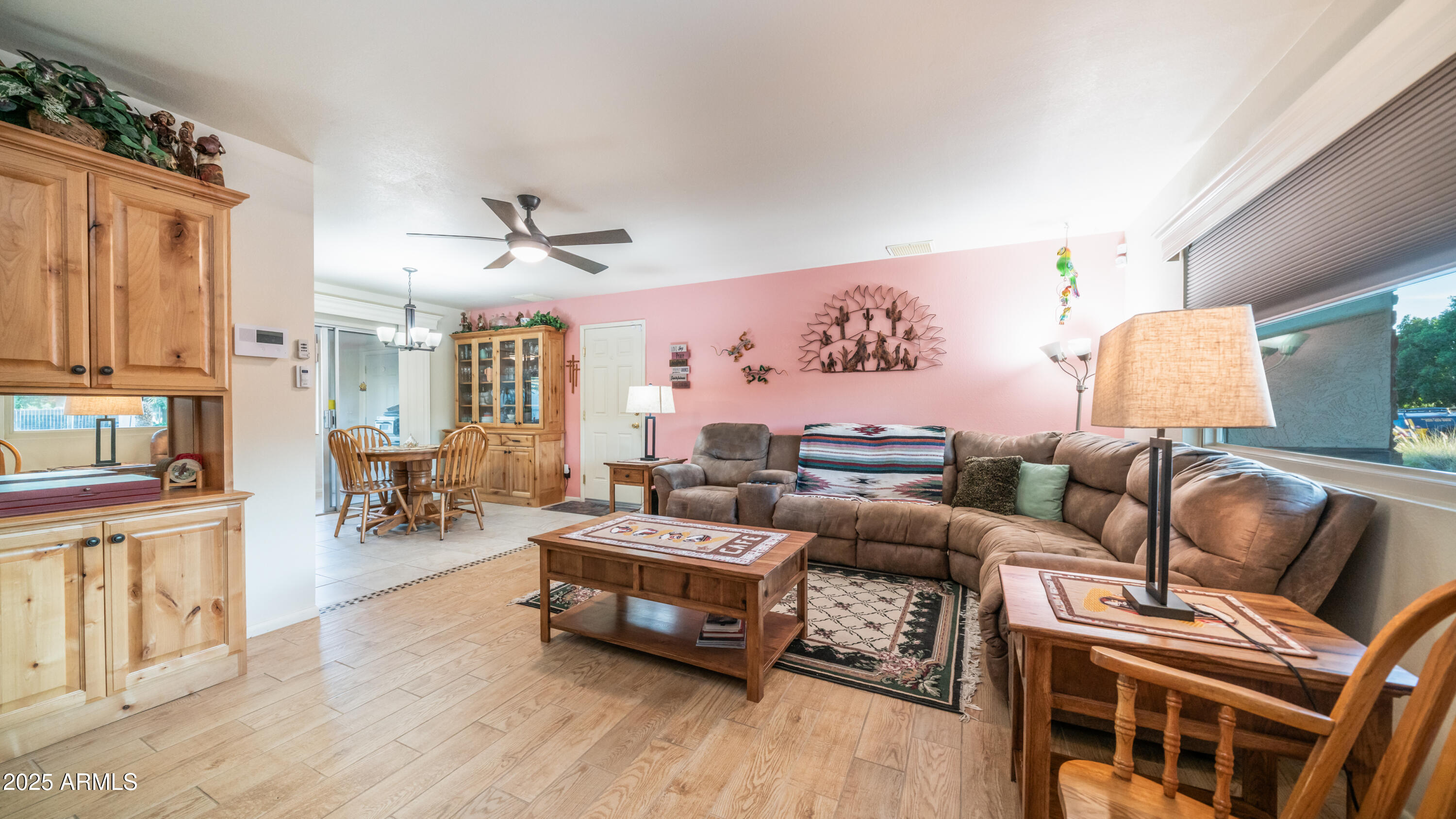 657 South Copper Drive Apache Junction, AZ 85120 - Photo 7 of 44 a living room with furniture and wooden floor