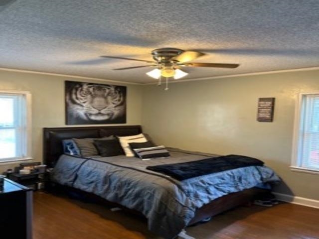 1010 Mt Vernon Road Memphis, TN 38111 - Photo 11 of 11 a bedroom with a bed and a chandelier