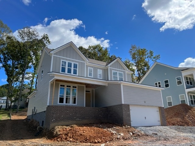7132 Pepper Tree Circle Fairview, TN 37062 - Photo 2 of 14 a front view of a house with a yard