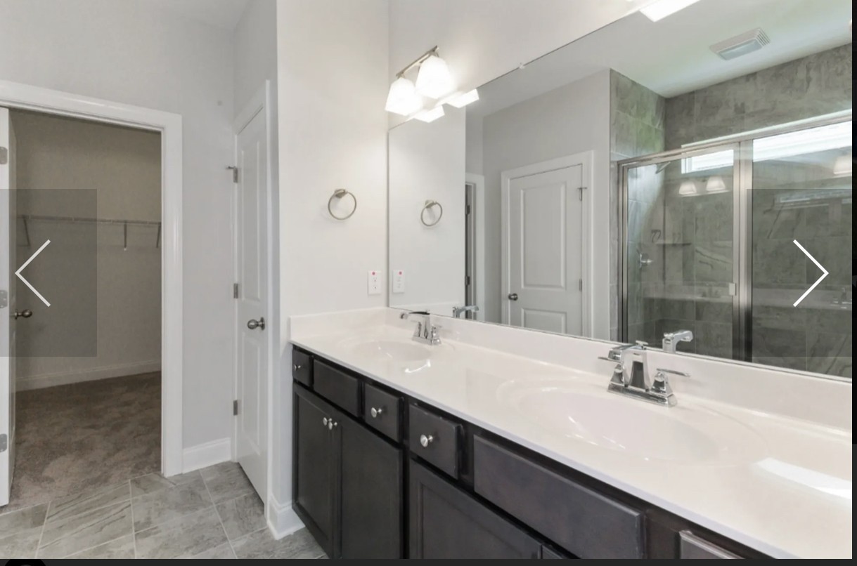 7132 Pepper Tree Circle Fairview, TN 37062 - Photo 10 of 14 a bathroom with a double vanity sink mirror and double