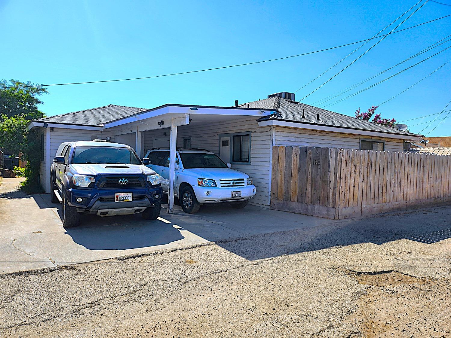 1074 South Klein Avenue Reedley, CA 93654 - Photo 2 of 2 a view of a car parked front of a house