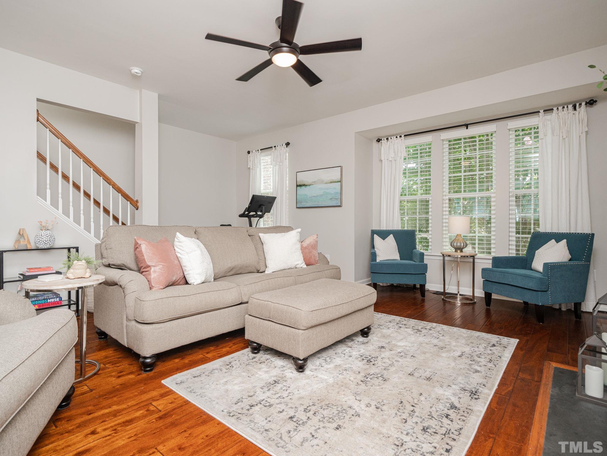 1307 Rodessa Run Raleigh, NC 27607 - Photo 11 of 36 a living room with furniture and a rug