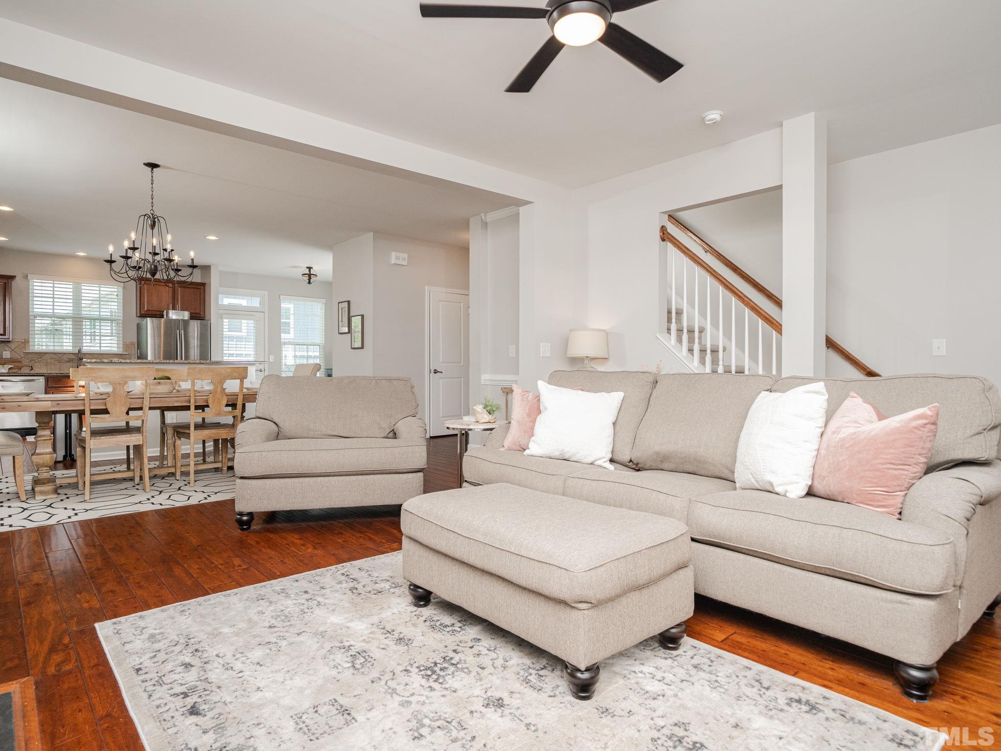 1307 Rodessa Run Raleigh, NC 27607 - Photo 12 of 36 a living room with furniture and a rug