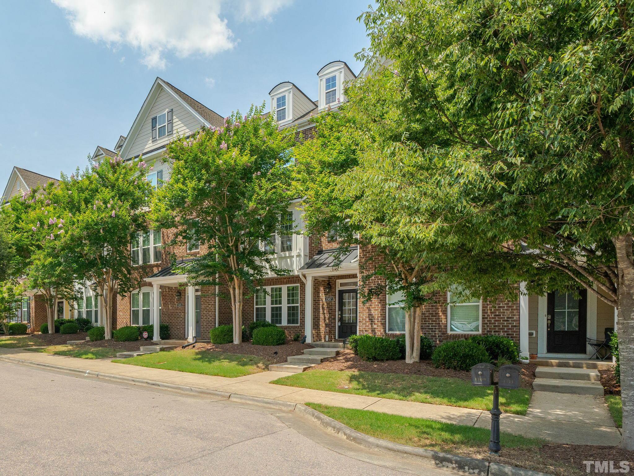 1307 Rodessa Run Raleigh, NC 27607 - Photo 2 of 36 front view of a house with a yard