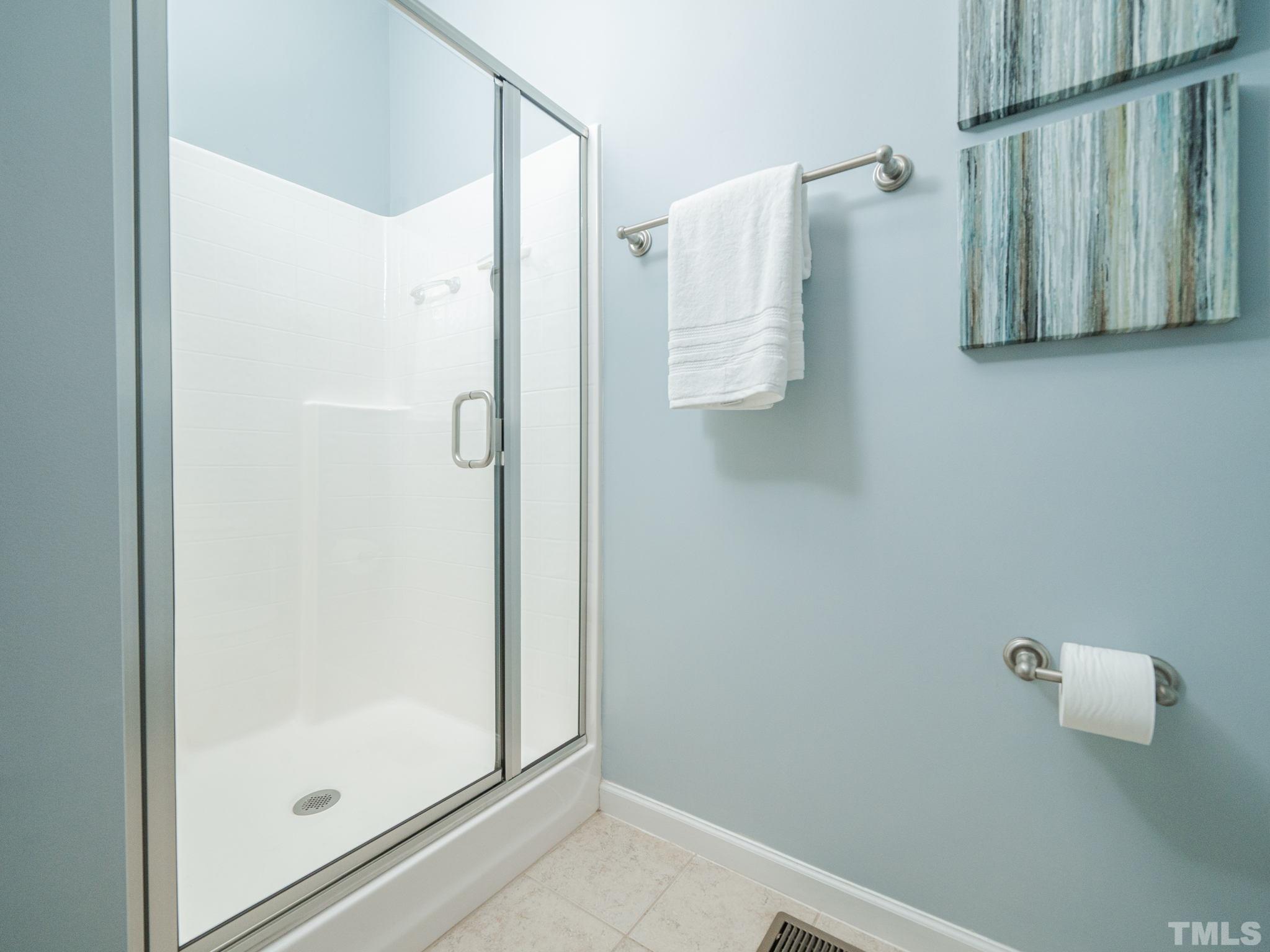 1307 Rodessa Run Raleigh, NC 27607 - Photo 24 of 36 a bathroom with a shower
