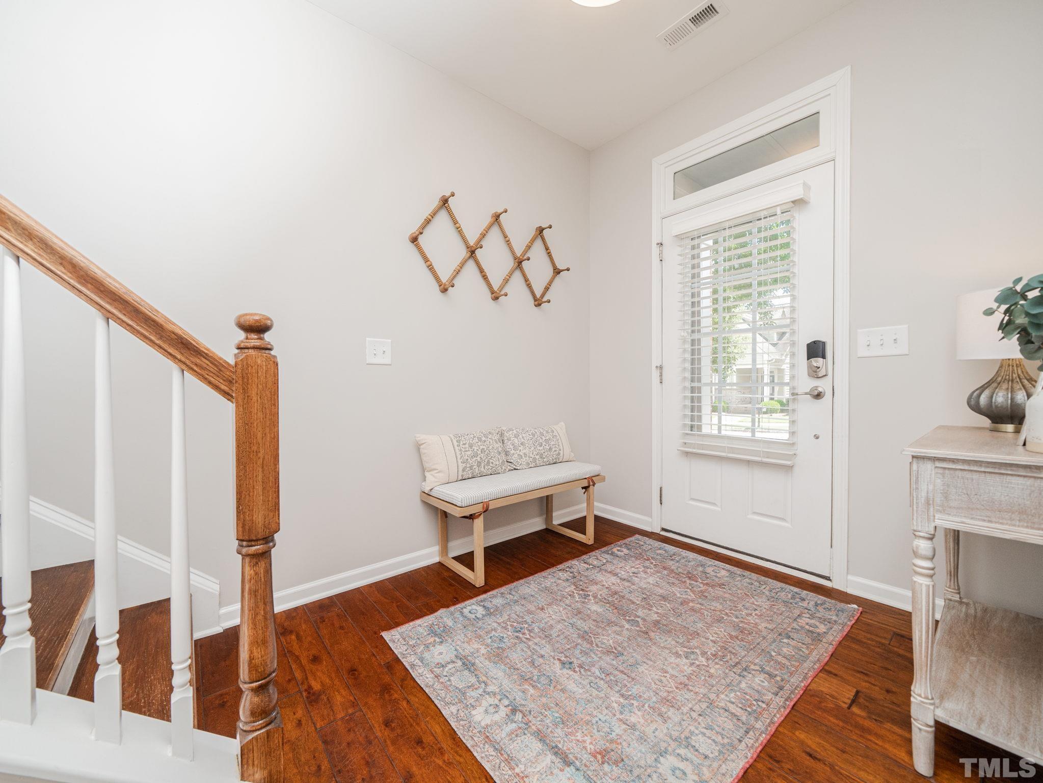 1307 Rodessa Run Raleigh, NC 27607 - Photo 3 of 36 a living room with furniture and a fireplace
