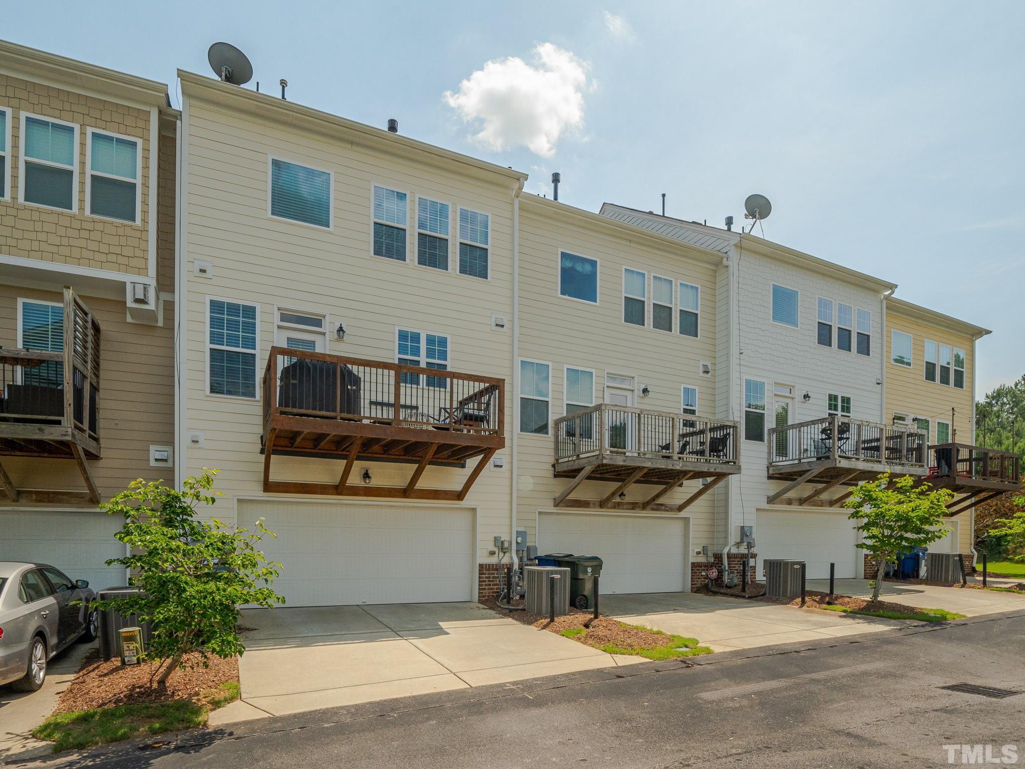 1307 Rodessa Run Raleigh, NC 27607 - Photo 33 of 36 a front view of a house with outdoor seating