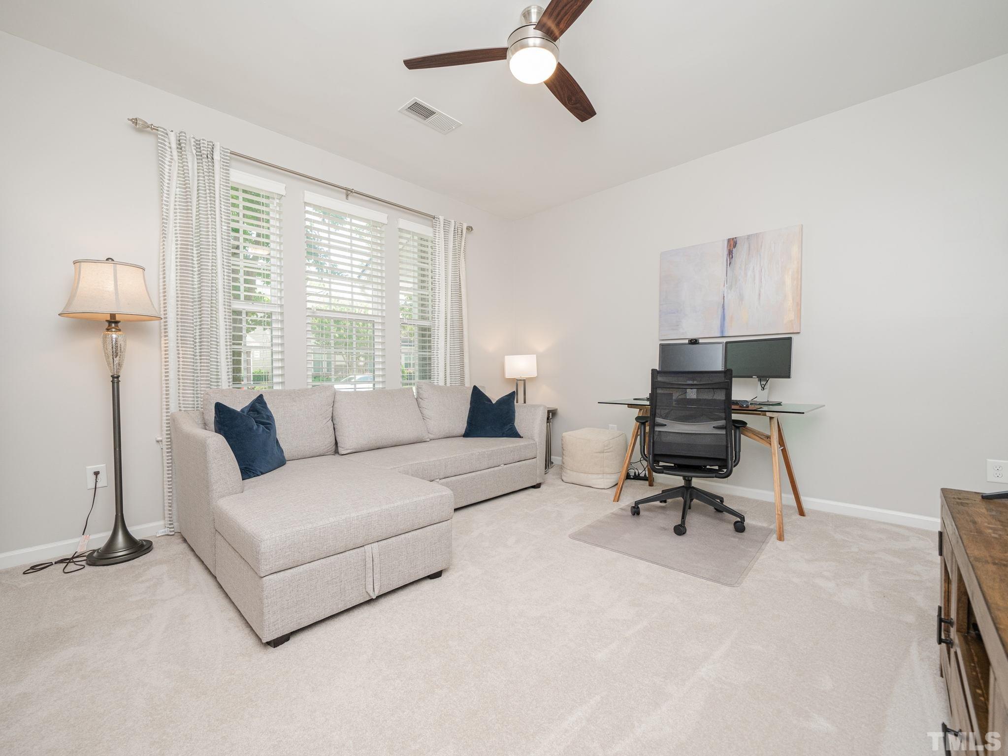 1307 Rodessa Run Raleigh, NC 27607 - Photo 6 of 36 a living room with furniture