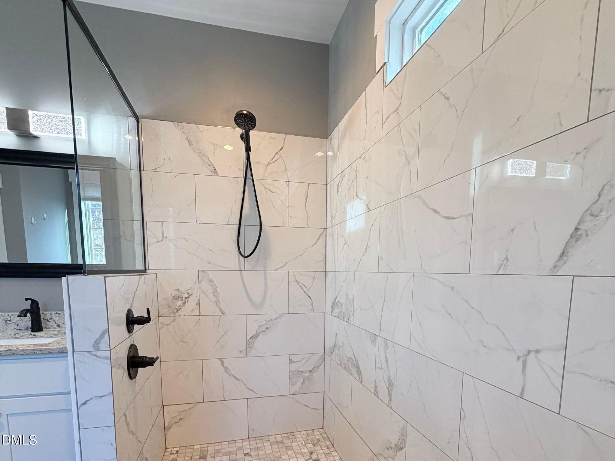 55 Running Deer Path Timberlake, NC 27583 - Photo 20 of 29 a bathroom with a shower