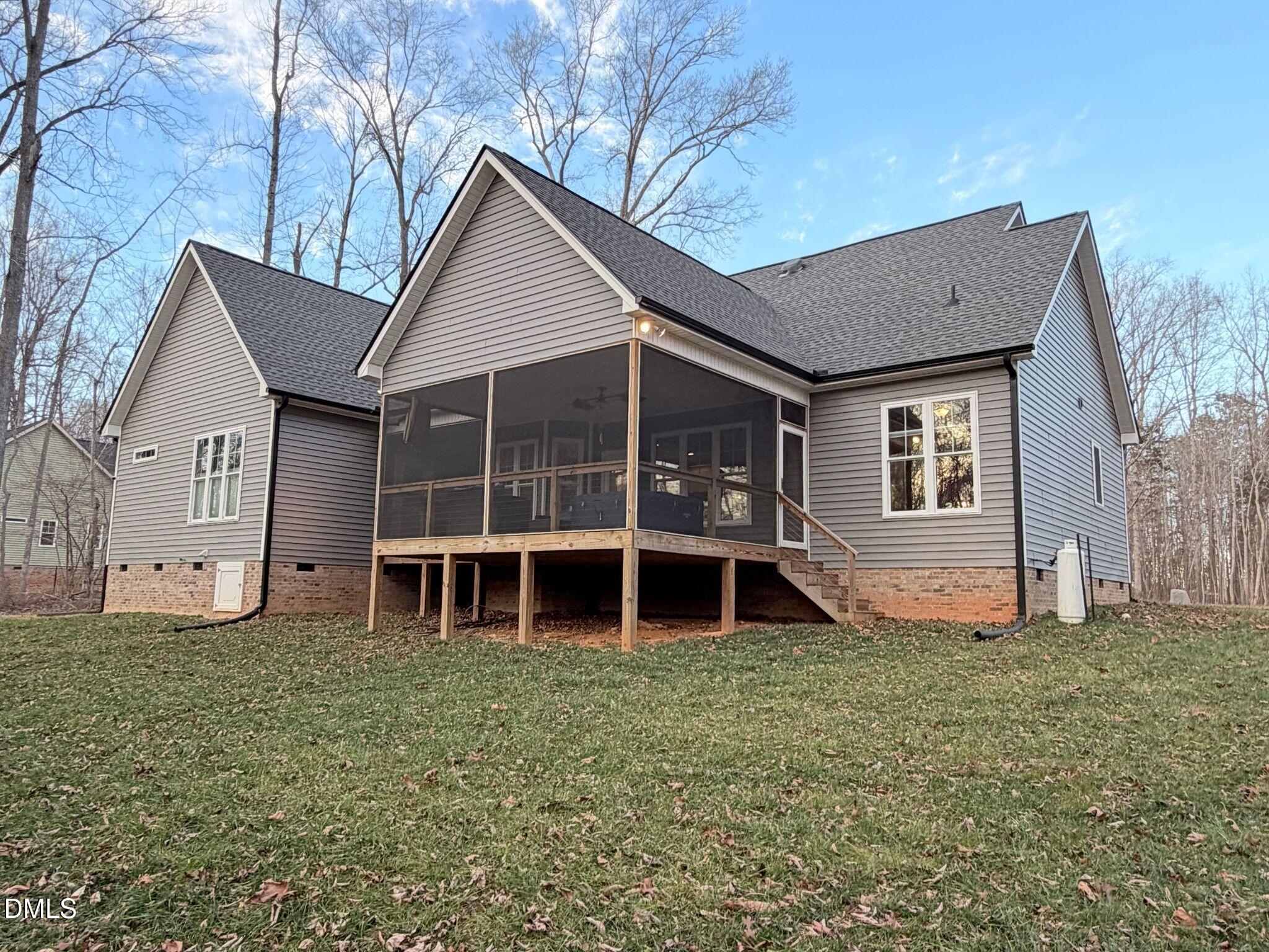 55 Running Deer Path Timberlake, NC 27583 - Photo 28 of 29 a front view of a house with a yard