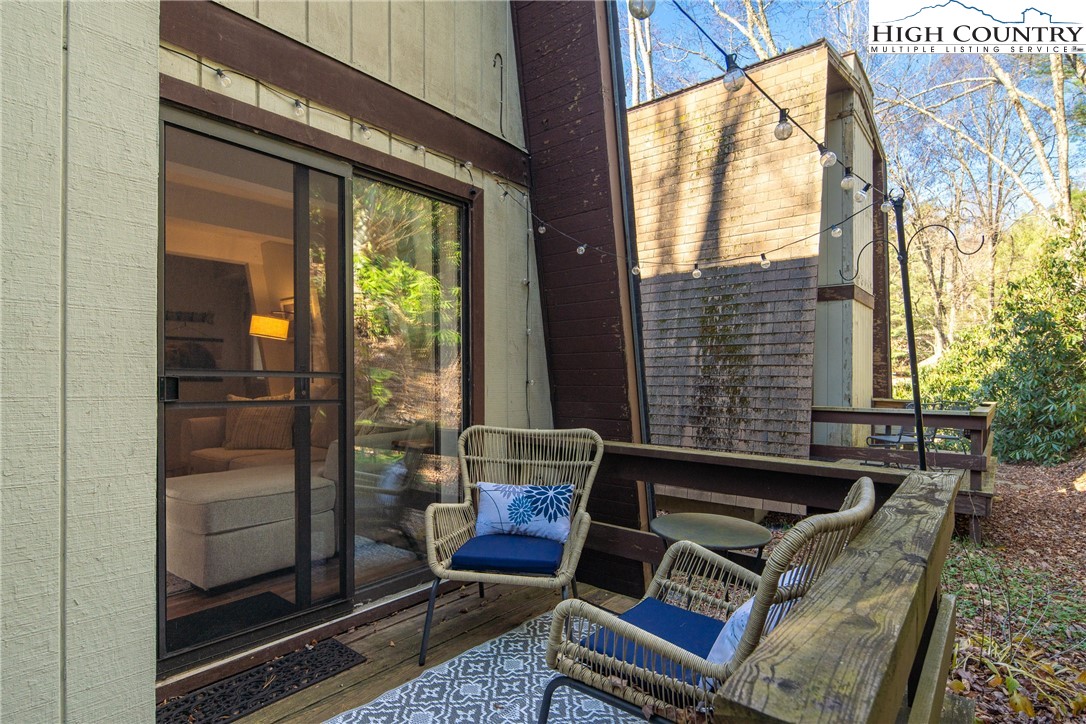 24 Creekside Court, Unit A Banner Elk, NC 28604 - Photo 16 of 24 a sitting area with furniture and windows