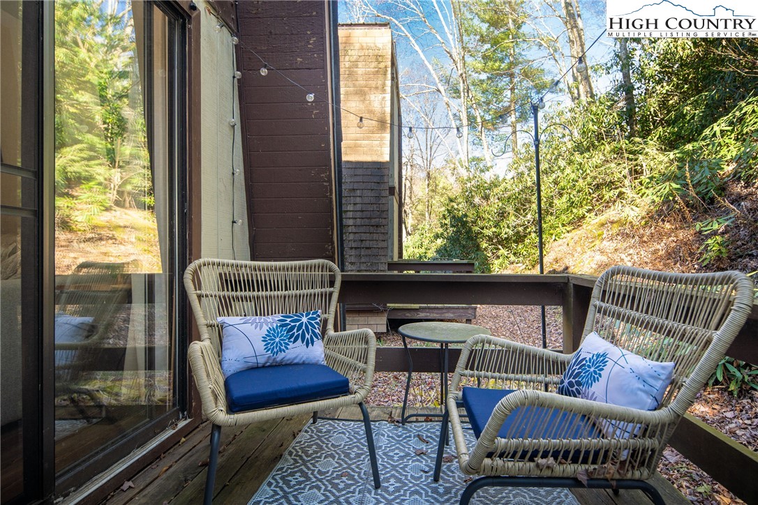 24 Creekside Court, Unit A Banner Elk, NC 28604 - Photo 17 of 24 a view of a balcony with chair