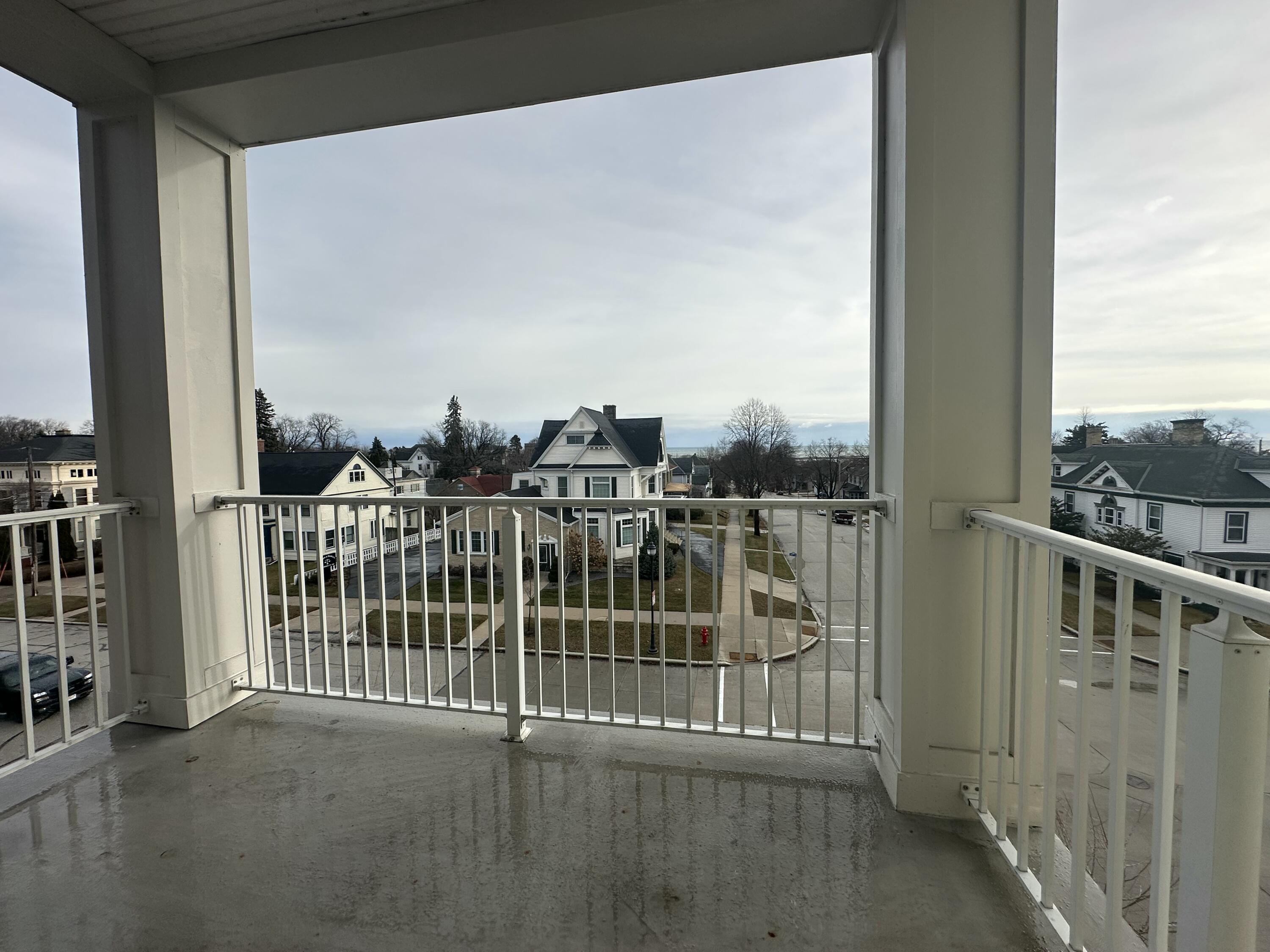 832 North 6th Street, Unit 321 Sheboygan, WI 53081 - Photo 30 of 30 Patio with Lake Michigan views