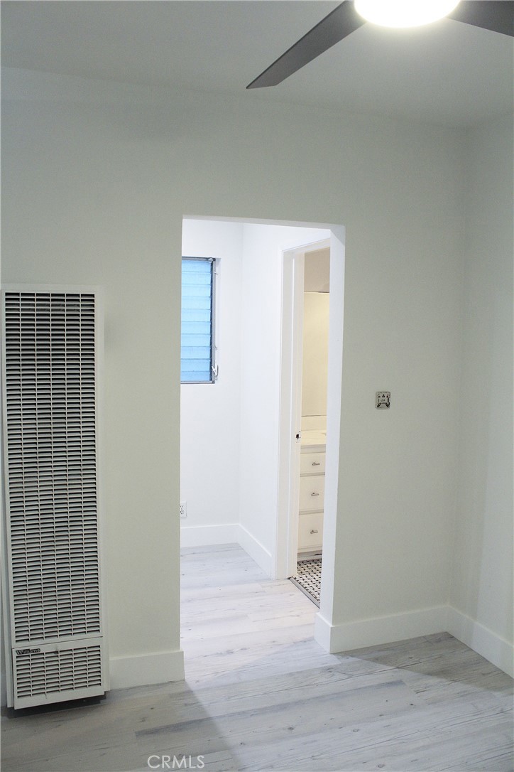 34 Ozone Avenue, Unit 2 Venice, CA 90291 - Photo 7 of 12 an empty room with wooden floor