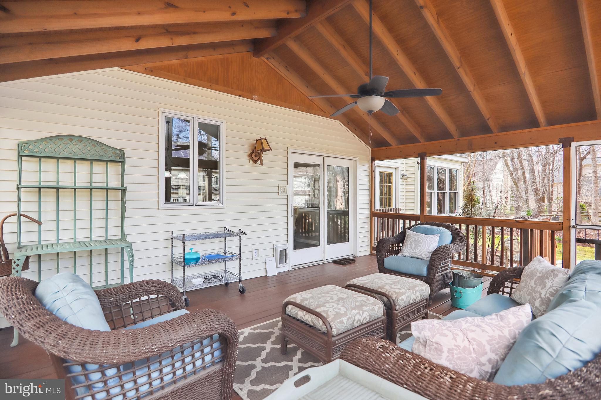 8001 Boulder Ridge Way Gaithersburg, MD 20882 - Photo 29 of 89 Screened porch with ceiling fan.
