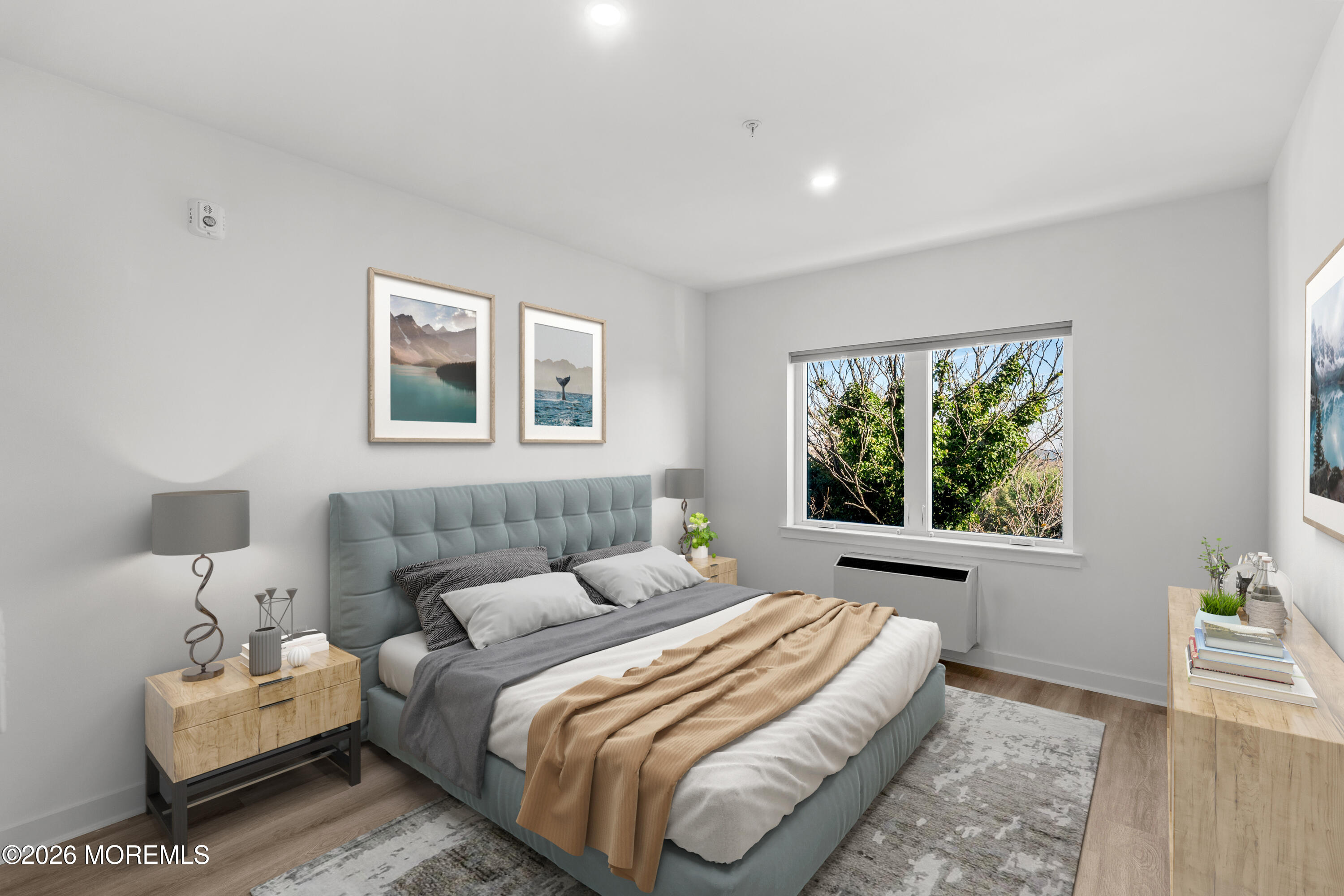 180 Morris Avenue, Unit 403 Long Branch, NJ 07740 - Photo 3 of 15 a bedroom with bed and a window