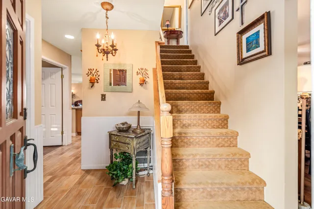 a kitchen with granite countertop a sink and a window