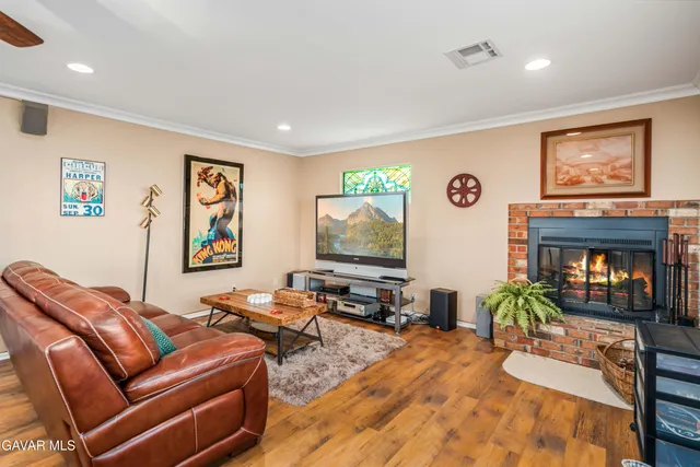 a view of a swimming pool with an outdoor seating and a floor