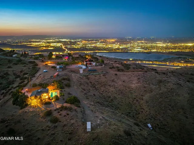 an aerial view of a house having yard