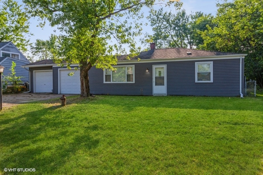 a house view with a garden space