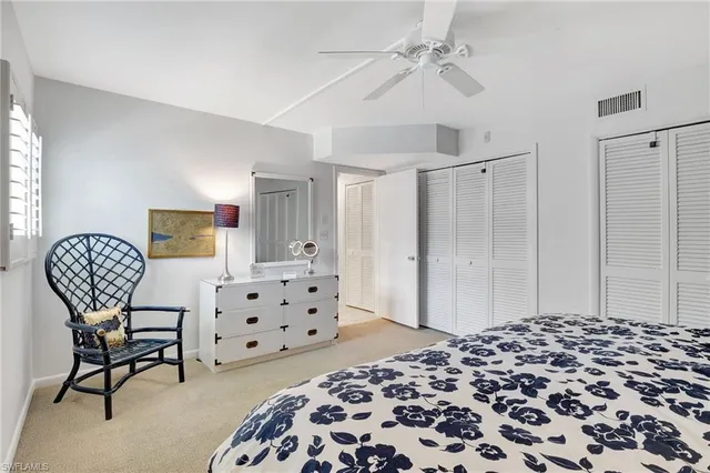 a bathroom with a double vanity sink mirror double and bathtub