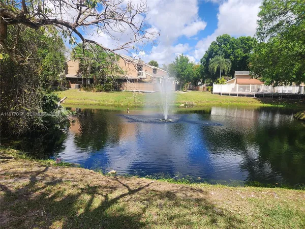 a view of a lake with houses